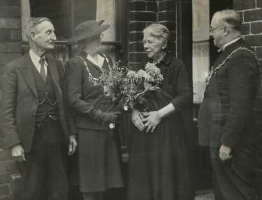 Lord Mayor, Councillor Samuel Hartley Marshall JP and the Lady Mayoress, Mrs Marshall meeting Mr and Mrs T. W. Scott of No. 2 Terry Street, Attercliffe on their diamond wedding anniversary