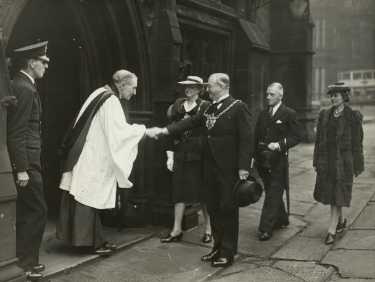 Lord Mayor, Councillor Samuel Hartley Marshall JP and the Lady Mayoress, Mrs Marshall being welcomed by the Provost of Sheffield and archdeacon, Dr  A. C. E. Jarvis for the National Day of Prayer service, Sheffield Cathedral, Church Street