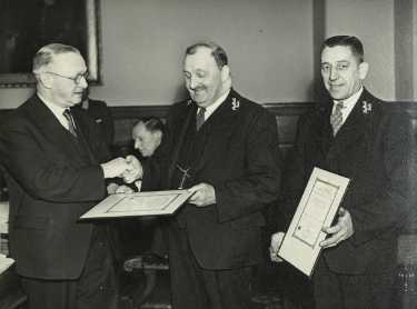Former Lord Mayor, Councillor Samuel Hartley Marshall JP (1st right) presenting safe driving certificates to drivers from the Parks Department
