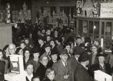 Shoppers at [?Brightside and Carbrook Co-operative Society store]