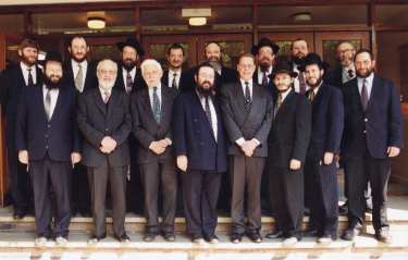 Rabbi Y. Golomb and delegation of Jewish men 