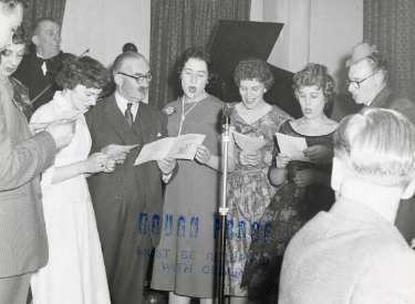 Sanderson Brothers and Newbould, steel manufacturers. Staff Christmas party at Kenwood Hall Hotel (latterly Hotel St. George and Mercure Sheffield Kenwood Hall and Spa), Kenwood Road, Nether Edge