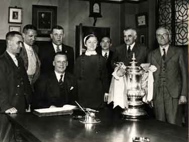 Players and officials of Sheffield Wednesday F.C., winners of the FA Cup in the boardroom, Royal Hospital, West Street