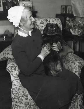Miss G. Sampson, Matron of the Royal Hospital, West Street, with her dog at the Eldon Street nurses accommodation