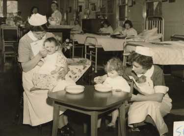 Nurses feeding children on children's ward, City General Hospital and (later known as the Northern General Hospital), Fir Vale, c.1960s