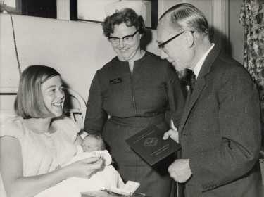 Presentation of certificate and badge by (right) editor of Sheffield Newspapers Ltd. to former nurse showing (centre) Margaret Jobling, matron, City General Hospital and (later known as the Northern General Hospital), Fir Vale, c.1960s