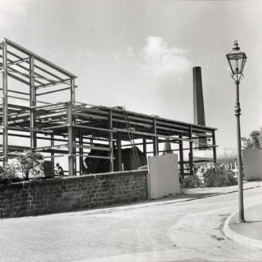 Construction work on site of new teaching hospital, (Royal Hallamshire Hospital), Glossop Road showing (top left) St. Mark C. of E. Church, Broomfield Road