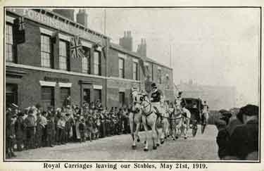 Royal carriages leaving the stables of Joseph Tomlinson and Sons, Bedford Street