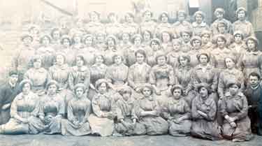 Unidentified group of women employees [?munitions workers?]