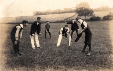 Unidentified group playing cricket