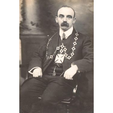Unidentified man with ceremonial chain