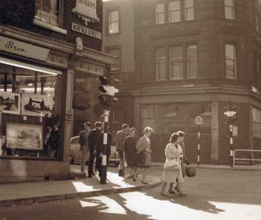 Junction of Norfolk Street and Surrey Street showing (left) No. 117 Hibbert Bros., fine art dealers