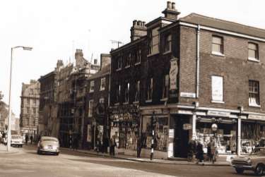 Junction of Norfolk Street and Surrey Street showing (r. to l.) No. 117 Hibbert Bros., fine art dealers; Nos. 111 - 115 Norfolk Cafe and No. 109 Brown Bear public house