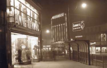 Tram on Fargate, ('Meadowhead via Pitsmoor'), showing (left) Nos. 62 - 64 Anne Lennard Ltd., costumiers, (centre) Nos. 33-35 James Woodhouse and Son, house furnishers, Nos. 41-43, W.P. Kenyon, estate agents