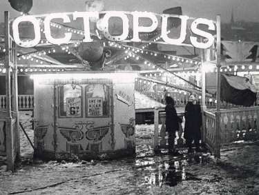 Octopus ride at the fair on a wet winter's night near the Sheffield Midland railway station