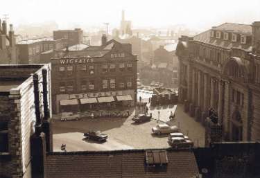 View of Fitzalan Square showing (centre) No. 11 Henry Wigfall and Son Ltd., house furnishers and (right) the General Post Office