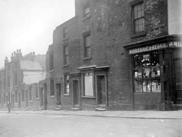 Demolition of back to back houses, Fawcett Street from Upper St. Philip's Road. No 129 and 131, Albert Flint, Beer Retailer, right