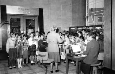 Children carol singing, entrance foyer, Central Library, Surrey Street 