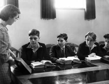 Miss Buchanan and boys, Library Committee room, Central Library, Surrey Street during school instruction
