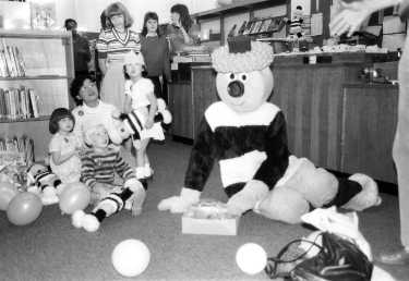 Bertie Bassett visits the Central Children's Library, Central Library, Surrey Street showing (2nd left) librarian, Sheila Hawker