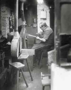 Ron Furniss, rough felting at Walter Trickett and Co. Ltd., spoons, forks and cutlery manufacturers, Anglo Works, No. 23 Trippett Lane