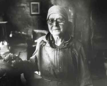Ethel Grayson, mirror polisher, in her workshop in Beehive Works, Milton Street