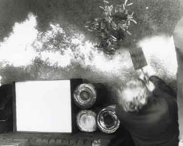 Ken Croft, hardener and temperer, cooling balades in his Beehive Works workshop, Milton Street