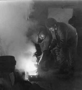 Casting metal at the Brass Foundry, Carver Lane