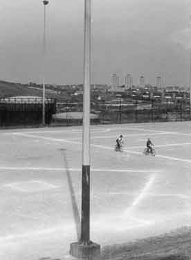 Sports facility showing (centre left) Neepsend gas holders and (centre right) Woodside and Pye Bank flats, Pitsmoor