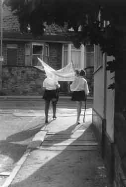 Women carrying a banner