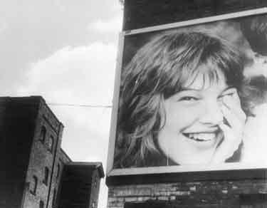 Advertising hoarding on Wharf Street, Canal Basin, Sheffield and South Yorkshire Navigation