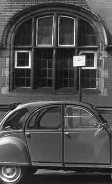 Car outside unidentified building