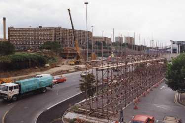 Construction of Park Square Supertram Bridge on (centre) Park Square showing (back centre) Park Hill and Norfolk Park Flats, c. 1992