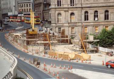 Construction of Park Square Supertram Bridge on Commercial Street showing (top right) Canada House (The old Gas Company Offices), c. 1992