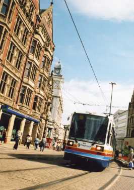 Supertram No. 104 on High Street showing (left) Parade Chambers