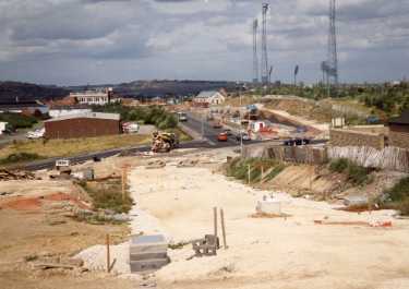 Supertram construction along Woodbourn Road showing (top left) floodlights for Woodbourn Road Athletics Stadium