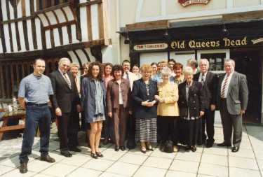 Unidentified group at entrance to the Old Queens Head public house (formerly Hall in the Ponds), No. 40 Pond Hill, after renovation