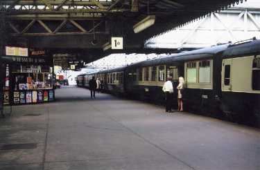 Platform 1, Sheffield Midland railway station showing (left) W. H. Smith and Son, newspaper stall