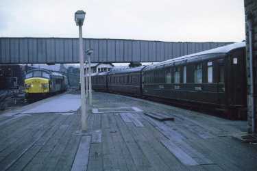 Diesel locomotive, Sheffield Midland railway station showing (right) passenger coaches including a medical coach