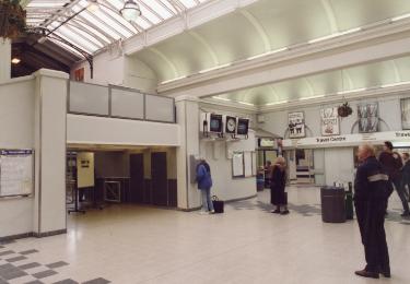 South Yorkshire Transport Executive (SYPTE). Station foyer showing (right) the ticket and information office and (top left) the footbridge, Sheffield Midland railway station