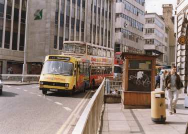 South Yorkshire Passenger Transport Executive (SYPTE). Buses on High Street approaching Castle Square showing (back left) House of Fraser, department store and (back right) No. 42 National Westminster Bank