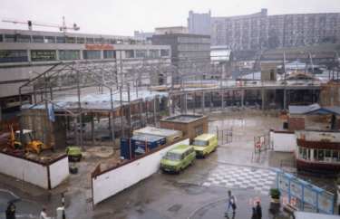 South Yorkshire Passenger Transport Executive (SYPTE). Construction of Pond Street Transport Interchange and Pond Street bus station showing (left) Royal Mail sorting office and Heriot House, offices an (top right) Park Hill Flats