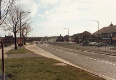 Ridgeway Road looking towards junction with Hollinsend Road showing (right) No.196 NSS Newsagents