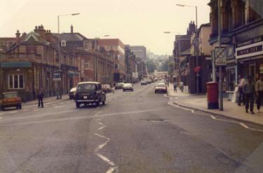 West Street at the junction of (centre) Glossop Road showing (left) Barclays Bank, Nos. 207 - 215 Glossop Road
