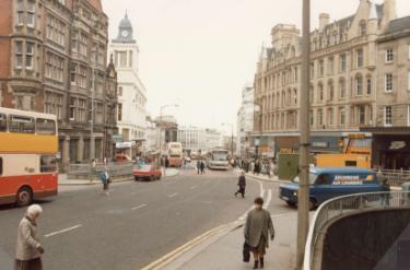 Church Street (foreground) looking towards High Street showing (right) junction with Fargate and (left) East Parade