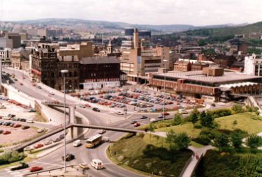View of Park Square roundabout showing (left) Commercial Street and Shude Hill and (right) Sheaf Market