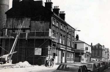 Demolition of shops on Division Street showing (centre) No. 102 the Royal Hospital Hearing Aid Centre and (right) No. 94 Prince of Wales Hotel (latterly the Frog and Parrot public house)