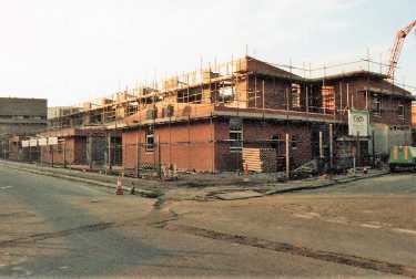 Construction of business units on Wellington Street at junction with (right) Eldon Street