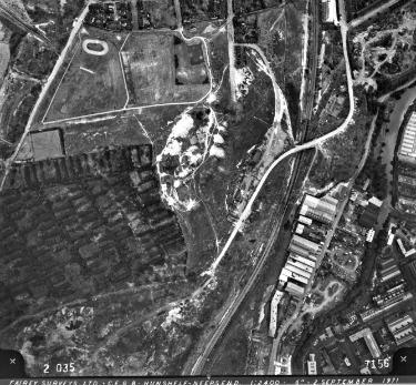 Parkwood Springs showing the landfill site to bottom left corner. The white road is Parkwood Road used as access to the landfill site.