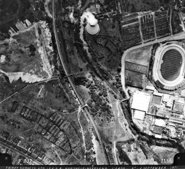 View of (top left) Neepsend Power Station showing (centre right) Owlerton Stadium, Livesey Street and George Bassett and Co.